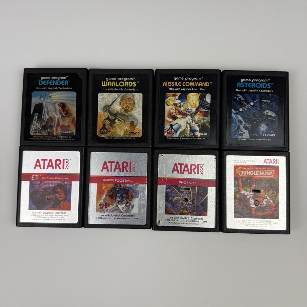 Atari 2600 Lot of 8 ET Football Phoenix Jungle Hunt Asteroids Warlords Defender+